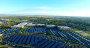 Aerial photo of a large ground-mounted solar panel array