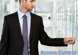 Photo of a man using an access control system with the words "access control"
