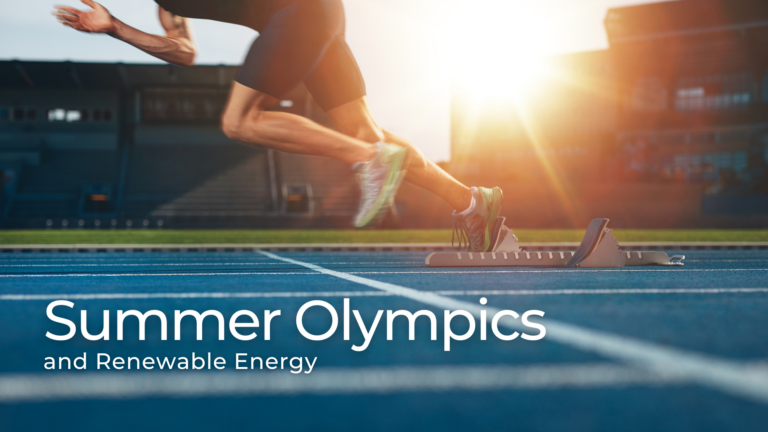 athlete runs on an Olympic track while the sun shines in the background